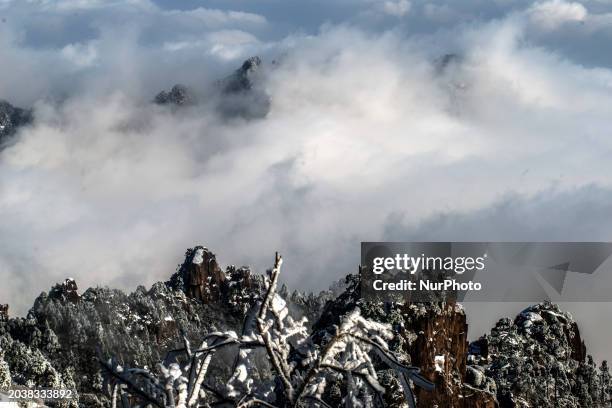 The landscape of Huangshan Mountain is shrouded in clouds in Huangshan City, Anhui Province, China, on January 29, 2018.