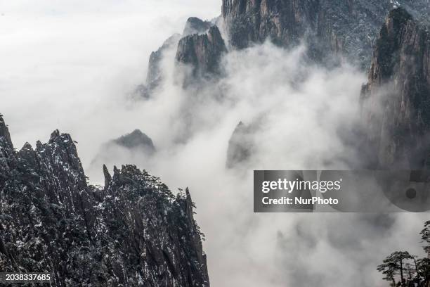 The landscape of Huangshan Mountain is shrouded in clouds in Huangshan City, Anhui Province, China, on January 29, 2018.