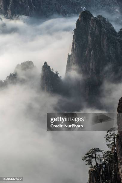 The landscape of Huangshan Mountain is shrouded in clouds in Huangshan City, Anhui Province, China, on January 29, 2018.