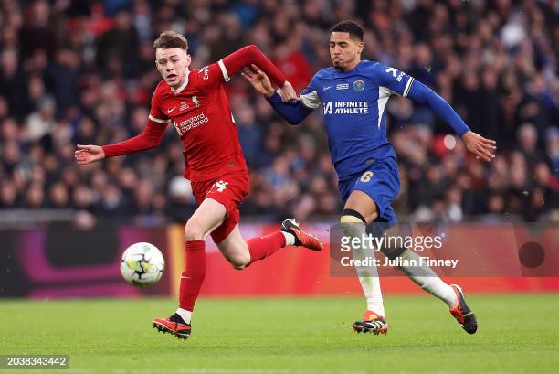 Conor Bradley of Liverpool battles for possession with Levi Colwill of Chelsea during the Carabao Cup Final match between Chelsea and Liverpool at...