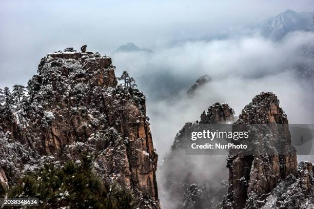 The landscape of Huangshan Mountain is shrouded in clouds in Huangshan City, Anhui Province, China, on January 29, 2018.