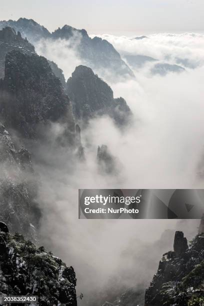 The landscape of Huangshan Mountain is shrouded in clouds in Huangshan City, Anhui Province, China, on January 29, 2018.