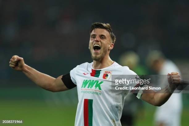 Ermedin Demirovic of FC Augsburg celebrates after the team's victory in the Bundesliga match between FC Augsburg and Sport-Club Freiburg at WWK-Arena...