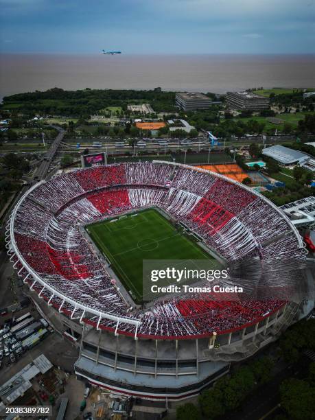 Aerial view of the stadium as a plane passes by prior to a Copa de la Liga Profesional 2024 derby match between River Plate and Boca Juniors at...