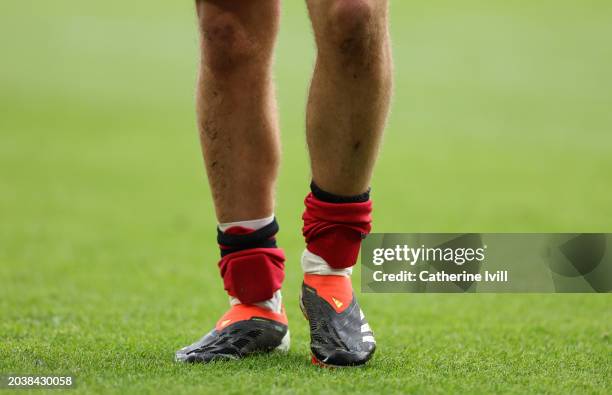 James McAtee of Sheffield United wearing small shin pads pushed down to his ankles during the Premier League match between Wolverhampton Wanderers...