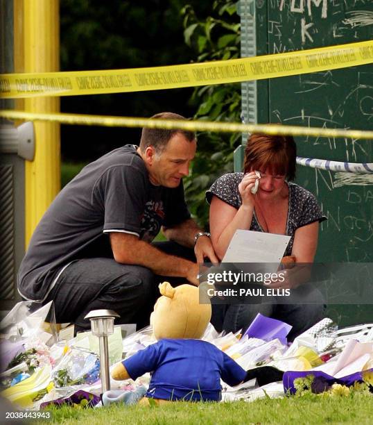 Melanie and Stephen Jones, the parents of murdered 11 year-old Rhys, visit the scene of their son's killing in Liverpool, north-west England, 24...