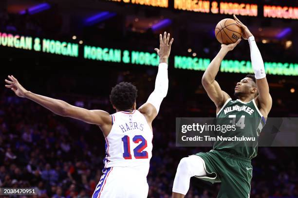 Giannis Antetokounmpo of the Milwaukee Bucks shoots over Tobias Harris of the Philadelphia 76ers during the third quarter at the Wells Fargo Center...