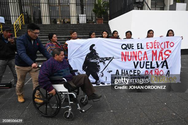 Enrique Garcia survirvor of a highway eviction carried out by the military in 2012 in which six Indigenous people died, attends a Mayan ceremony...