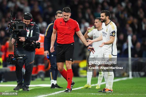 Referee Isidro Diaz de Mera reacts before being replaced by Fourth Official, Carlos Fernandez Buergo during the LaLiga EA Sports match between Real...