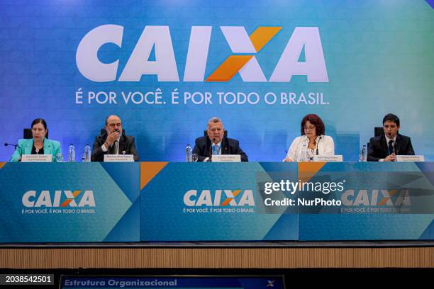 Carlos Vieira, the president of Caixa Economica Federal, is presenting the results of the fourth quarter of 2023 during a press conference in Sao...