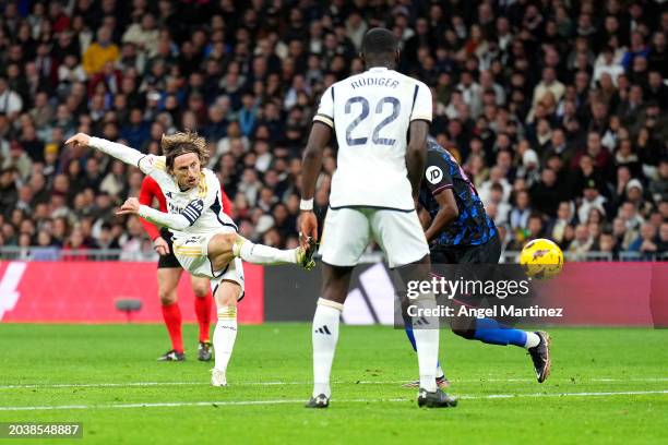 Luka Modric of Real Madrid scores his team's first goal during the LaLiga EA Sports match between Real Madrid CF and Sevilla FC at Estadio Santiago...