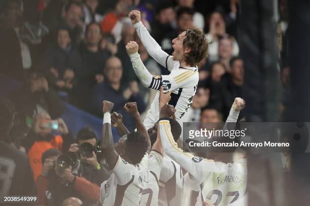 Luka Modric of Real Madrid CF celebrates scoring their opening goal with teammates during La Liga EA Sports match between Real Madrid and Sevilla FC...