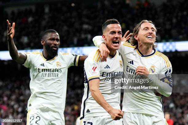 Luka Modric of Real Madrid celebrates scoring his team's first goal with Lucas Vazquez during the LaLiga EA Sports match between Real Madrid CF and...