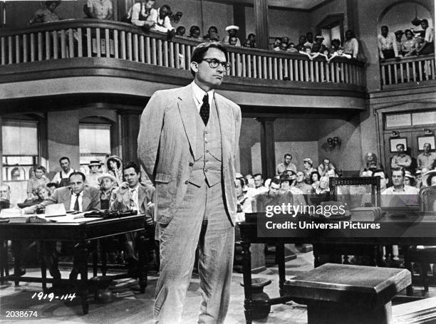 American actor Gregory Peck, as Atticus Finch, stands in a courtroom in a scene from director Robert Mulligan's film, 'To Kill A Mockingbird,' 1962....