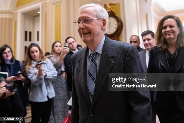 Senate Minority Leader Mitch McConnell walks into the Senate chamber on February 28, 2024 in Washington, DC. McConnell announced Wednesday that he...
