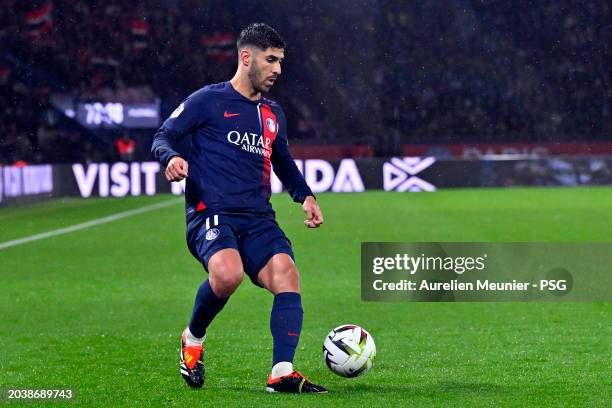 Marco Asensio of Paris Saint-Germain runs with the ball during the Ligue 1 Uber Eats match between Paris Saint-Germain and Stade Rennais FC at Parc...