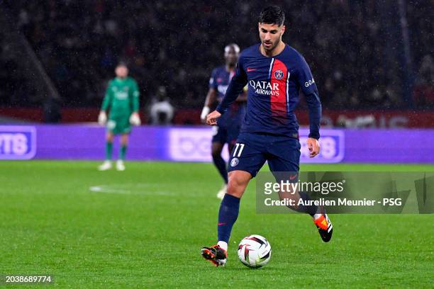 Marco Asensio of Paris Saint-Germain runs with the ball during the Ligue 1 Uber Eats match between Paris Saint-Germain and Stade Rennais FC at Parc...