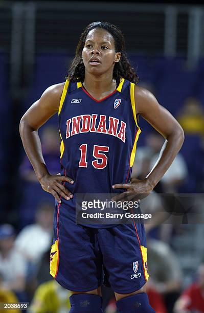 Nikki McCray of the Indiana Fever looks on against the Phoenix Mercury during the WNBA game at America West Arena on May 17, 2003 in Phoenix,...