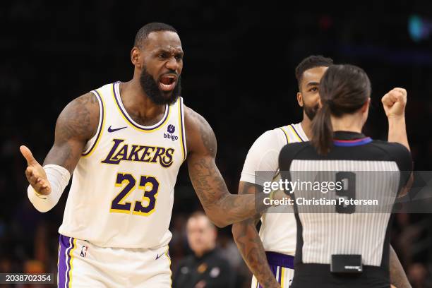 LeBron James of the Los Angeles Lakers reacts to referee Natalie Sago after a foul call during the second half of the NBA game against the Phoenix...