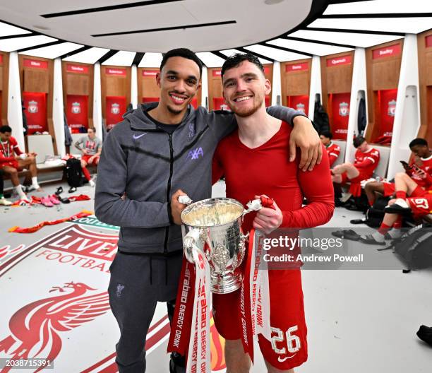 Trent Alexander-Arnold and Andy Robertson of Liverpool with the Carabao Cup in the dressing room after the Carabao Cup Final between Chelsea and...