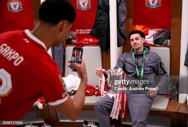 Curtis Jones of Liverpool with the Carabao Cup in the dressing room after the Carabao Cup Final between Chelsea and Liverpool at Wembley Stadium on...