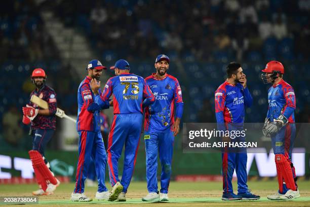 Karachi King's cricketers celebrates after dismissing Islamabad United's Imad Wasim during the Pakistan Super League Twenty20 cricket match between...