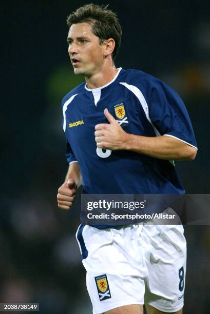 September 8: Jackie Mcnamara of Scotland running during the World Cup Qualifier Group 5 match between Scotland and Slovenia at Hampden Park on...