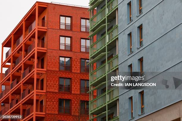 This photograph taken on February 27, 2024 shows a view of residential accommodation buildings at the Olympic village where the athletes will be...