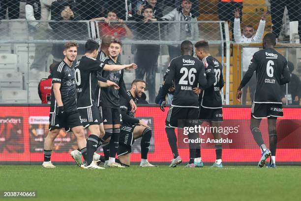 Cenk Tosun of Besiktas celebrates with his teammates after scoring a goal during the Ziraat Turkish Cup quarter final football match between Besiktas...