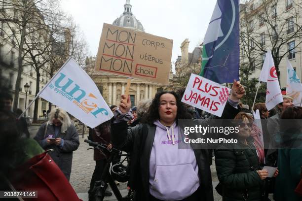 Protester is holding a sign that reads ''My body, My uterus, My choice'' during a silent gathering at Place de la Sorbonne, organized by the...