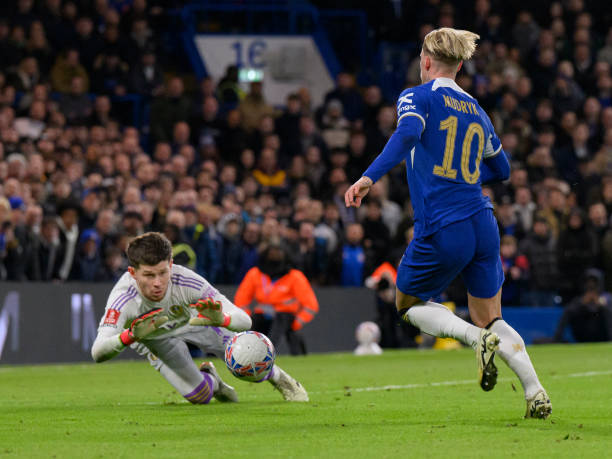 Leeds United's Illan Meslier under pressure from Chelsea's Mykhaylo Mudryk \rduring the Emirates FA Cup Fifth Round match between Chelsea and Leeds...