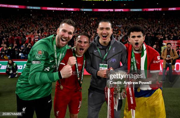 Adrian, Alexis Mac Allister, Darwin Nunez and Luis Diaz of Liverpool with the Carabao Cup trophy at the end of the Carabao Cup Final between Chelsea...