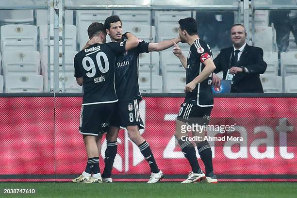 Salih Ucan of Besiktas celebrates with his teammates after scoring his team's first goal during the Ziraat Turkish Cup match between Besiktas and...