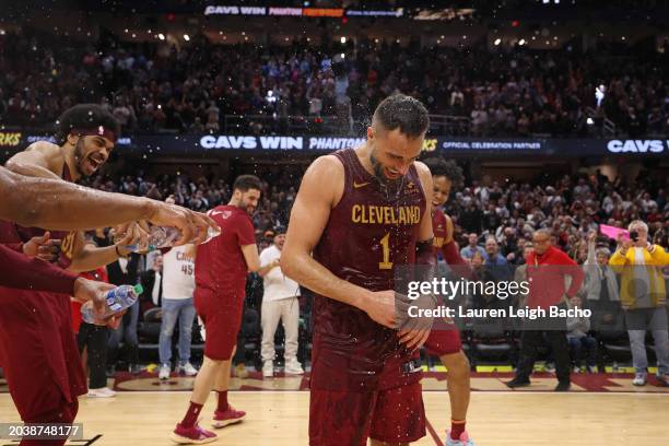 Max Strus of the Cleveland Cavaliers celebrates with teammates after the game against the Dallas Mavericks on February 27, 2024 at Rocket Mortgage...