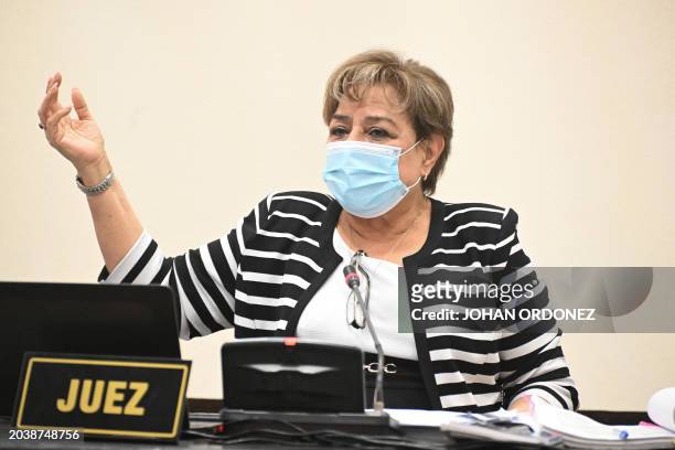 Guatemalan judge Maria Eugenia Castellanos speaks during a sentencing hearing against nine soldiers at a court in Guatemala City on February 28,...
