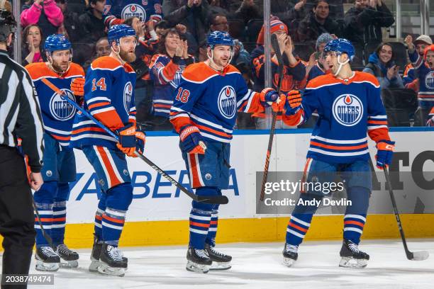 Zach Hyman of the Edmonton Oilers celebrates his second goal of the game in the second-period against the St. Louis Blues with teammates Evan...