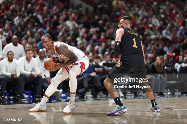 DeMar DeRozan of the Chicago Bulls handles the ball during the game against the Cleveland Cavaliers on February 28, 2024 at United Center in Chicago,...