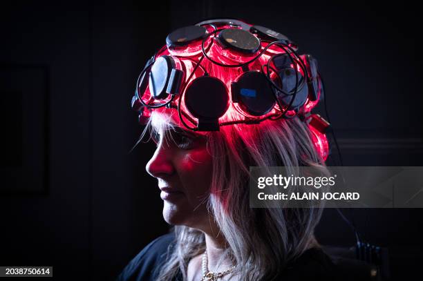 Former french rugby player and French national women's rugby team captain Marie-Alice Yahe undergoes a session for infrared concussion treatment, in...