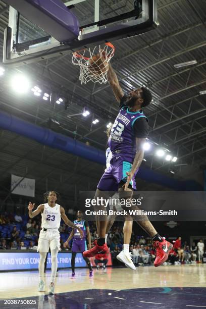 Jeremiah Tilmon of the Greensboro Swarm dunks the ball during the game against Delaware Blue Coats on February 28, 2024 at Greensboro Coliseum in...