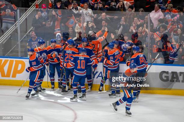 Connor McDavid of the Edmonton Oilers celebrates his overtime game winning goal against the St. Louis Blues with his teammates at Rogers Place on...