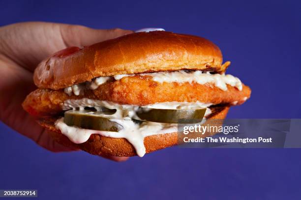Popeye's Classic Flounder Fish Sandwich made with premium flounder, marinated in Louisiana herbs & spices served on a brioche bun with barrel cured...