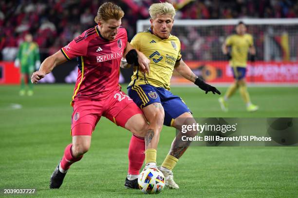 Tim Parker of St. Louis City SC and Diego Luna Real Salt Lake fight for the ball during a game between Real Salt Lake and St. Louis City SC at...