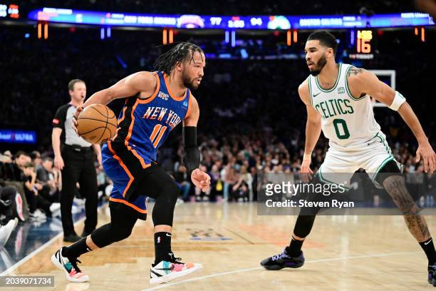 Jalen Brunson of the New York Knicks is defended by Jayson Tatum of the Boston Celtics during the game at Madison Square Garden on February 24, 2024...