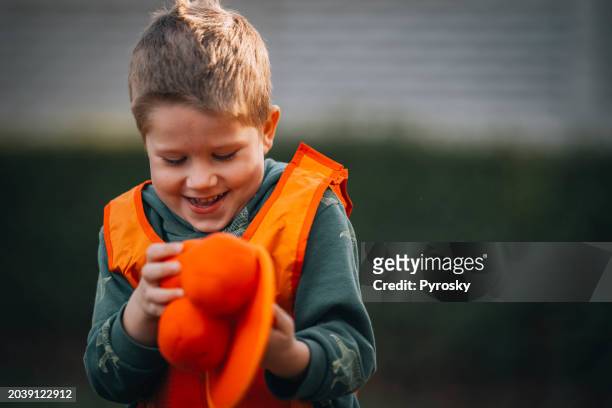 boy playing outdoors - eastern european stock pictures, royalty-free photos & images