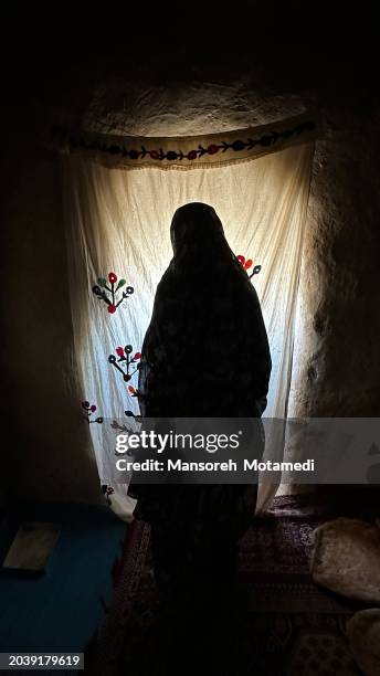 a muslim woman in her house - i love palestine stock pictures, royalty-free photos & images