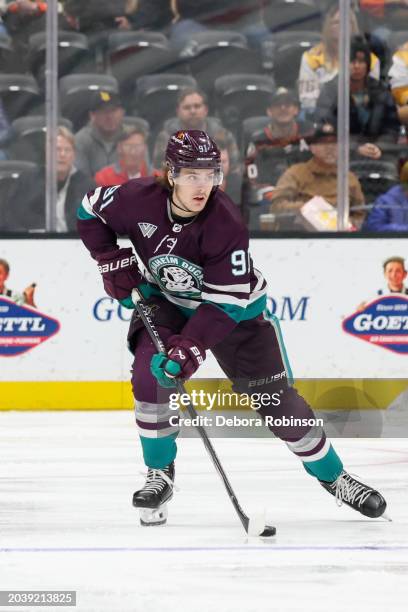 Leo Carlsson of the Anaheim Ducks skates with the puck during the third period against the Nashville Predators at Honda Center on February 25, 2024...