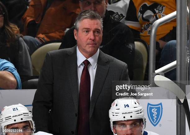 Head coach Patrick Roy of the New York Islanders looks on against the Pittsburgh Penguins at PPG PAINTS Arena on February 20, 2024 in Pittsburgh,...