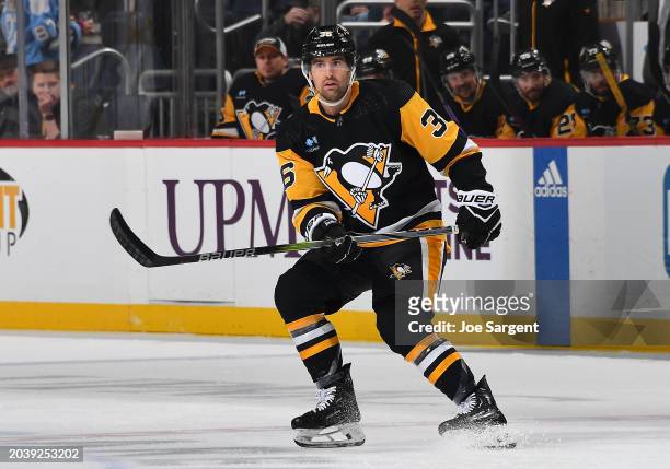 Colin White of the Pittsburgh Penguins skates against the New York Islanders at PPG PAINTS Arena on February 20, 2024 in Pittsburgh, Pennsylvania.