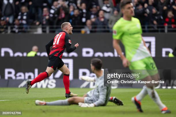 Philipp Max of Eintracht Frankfurt celebrates after scoring his team’s first goal during the Bundesliga match between Eintracht Frankfurt and VfL...