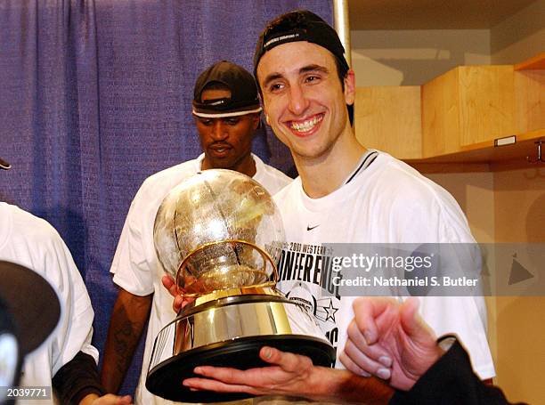 Emanuel Ginobili of the San Antonio Spurs with the Western Conference Championship Trophy after their win over the Dallas Mavericks in Game six of...